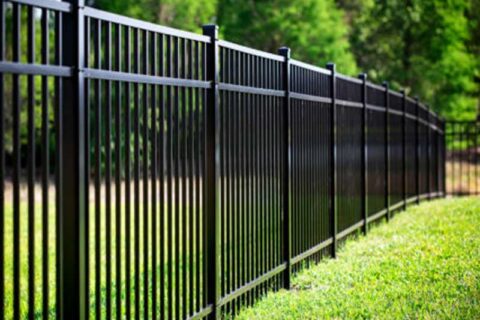 Black color fence on the garden.